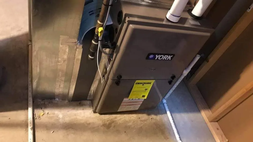 Six Star Heating & Cooling — Furnace & coil in alcove